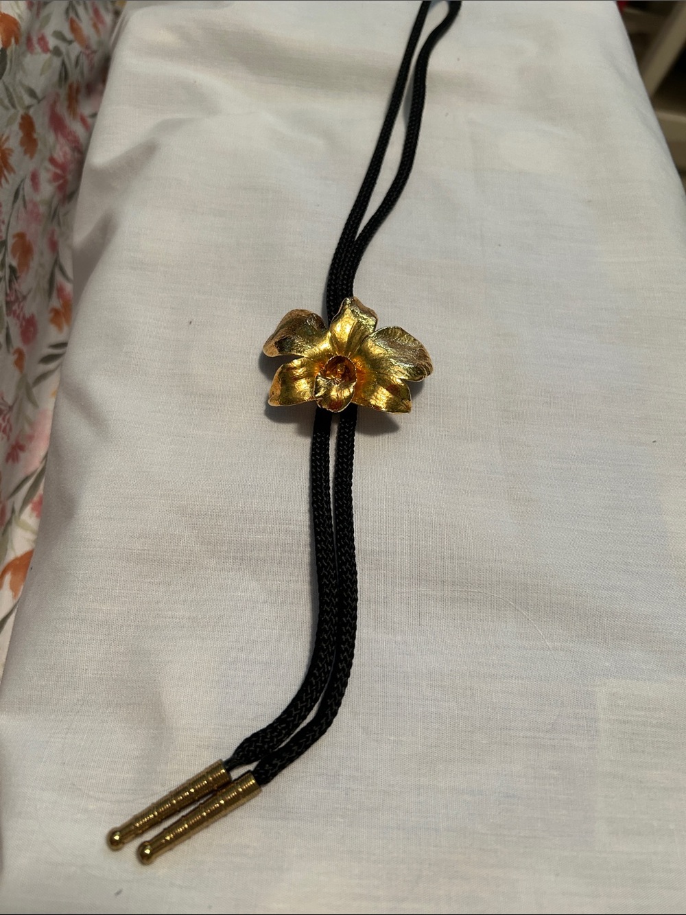 Gold Leaf Orchid Floral Slide Bolo Tie with Black Cord